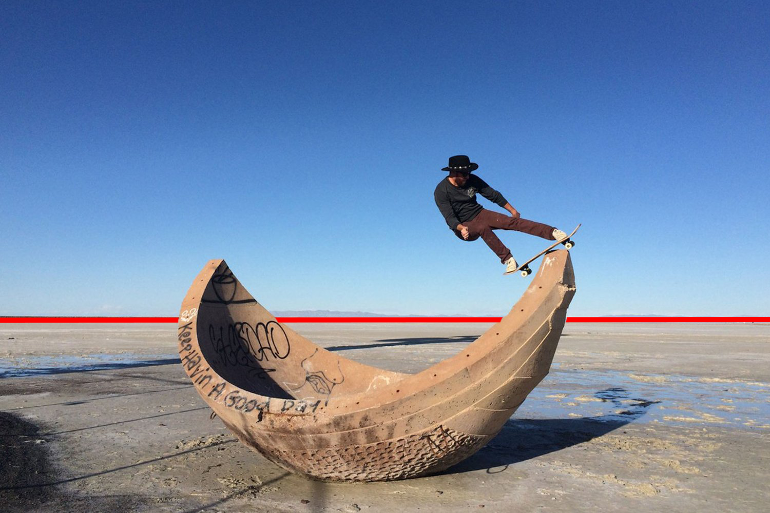 Billy Bones from Landyachtz skating in the desert normal horizon