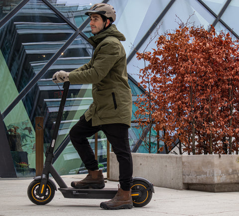 Segway-Ninebot Max G30 p second generation electric kickscooter for adults. Winter riding in Toronto with helmet, jacket, and gloves.