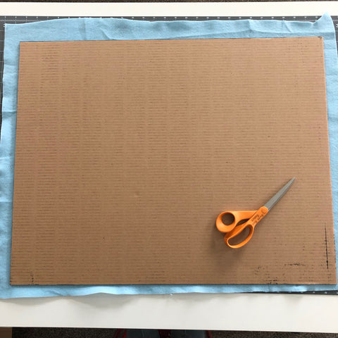 Making a felt board to hang on the wall for screen free play.