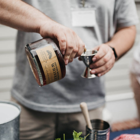 Man making cocktails on his 50th birthday