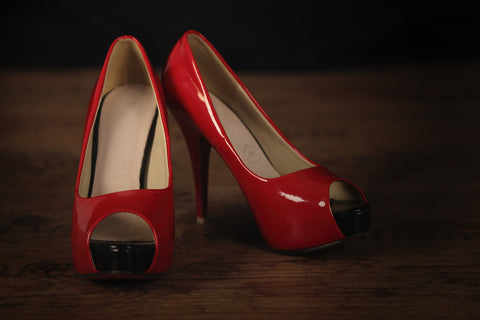 Red high heels from a birthday party for a man turning 50