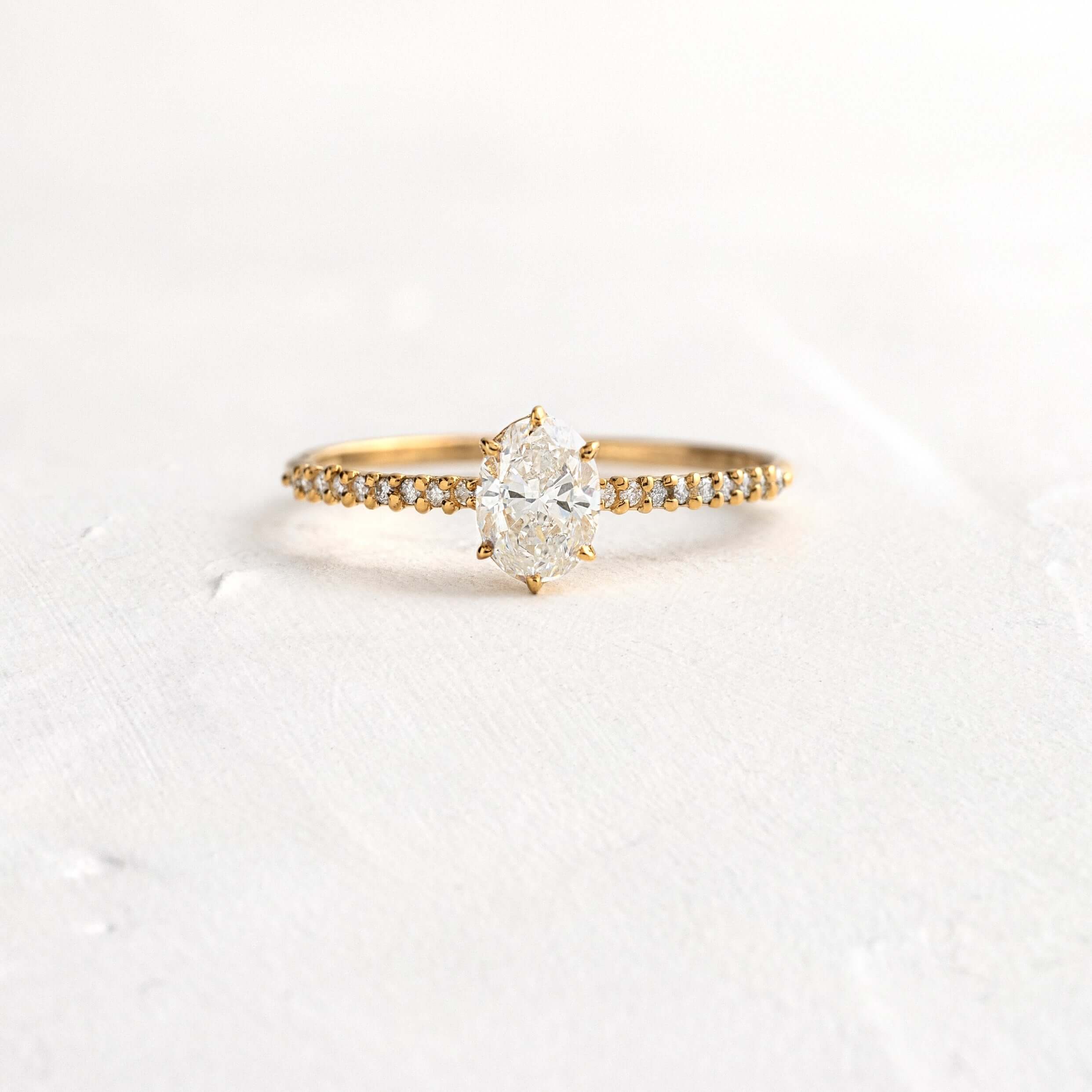 Whisper Ring with Pave Band, Oval Cut Diamond | Melanie Casey