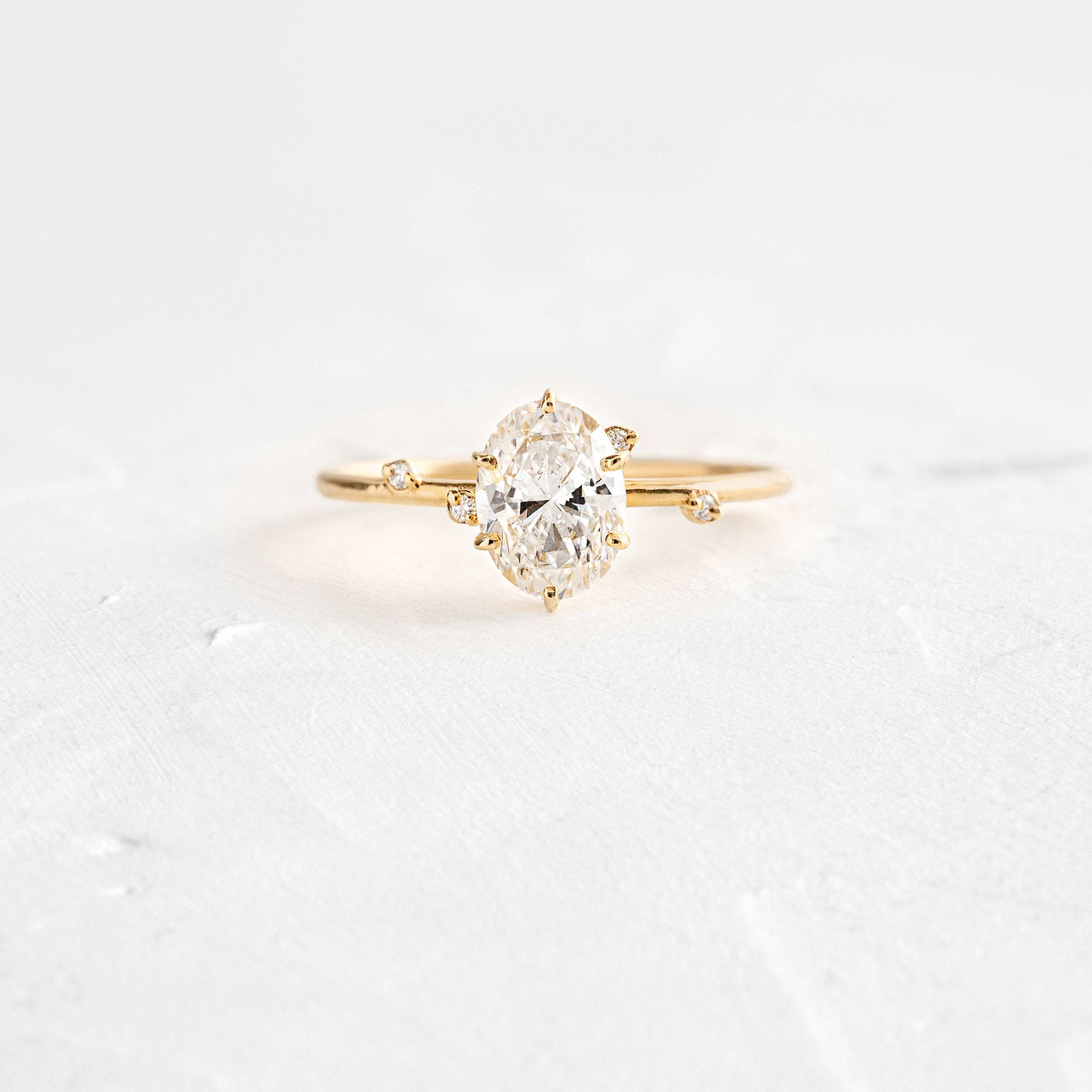 Unveiled Ring with Scattered Diamonds, 1ct. Oval Cut Diamond – Melanie ...