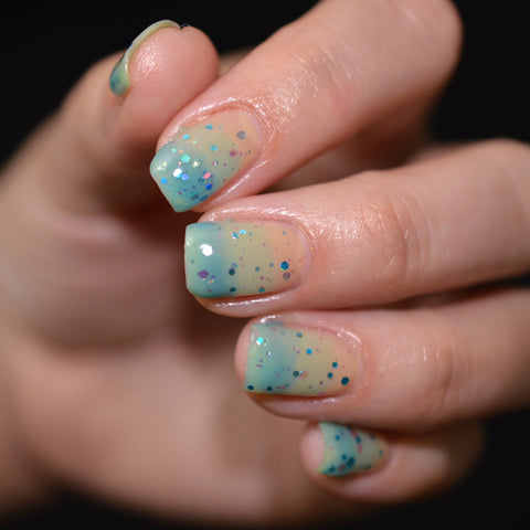 BLUSH Lacquers Sparkling Seas Quartet in a horizontal gradient manicure