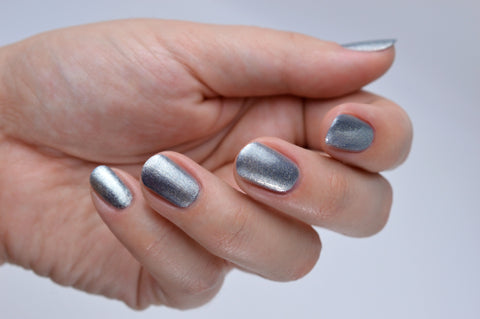 Icy blue metallic nail polish, The Suitor with a glossy top coat