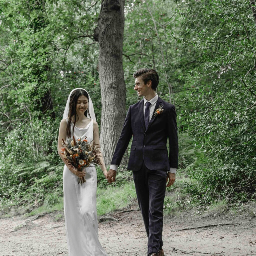 Image of a Bride in the park with a Luxury Bridal Bouquet of dried flowers