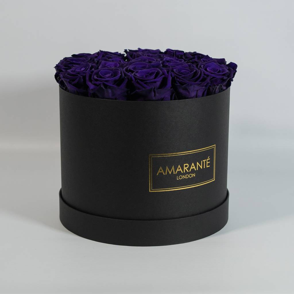 Purple Roses in a black round hatbox with a matte finish - Amaranté Forever Flowers