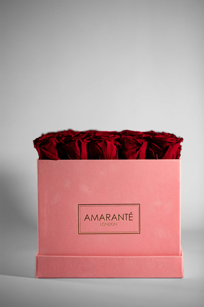 Red Roses in pink suede hatbox