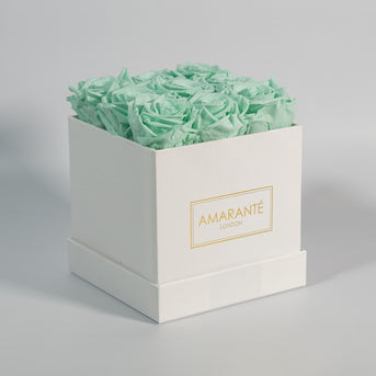 mint green roses in classic square hatbox