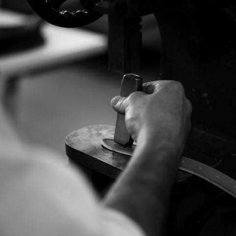 Adding our Logo to the leather belts - Angus Barrett Saddlery