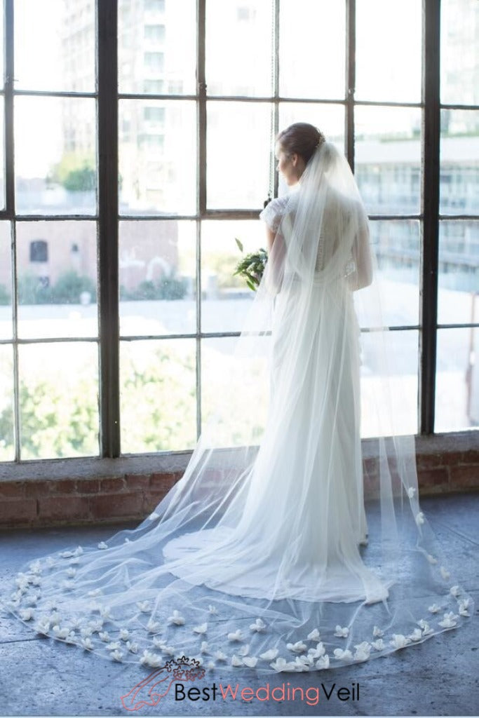 wedding dress with flowers on bottom