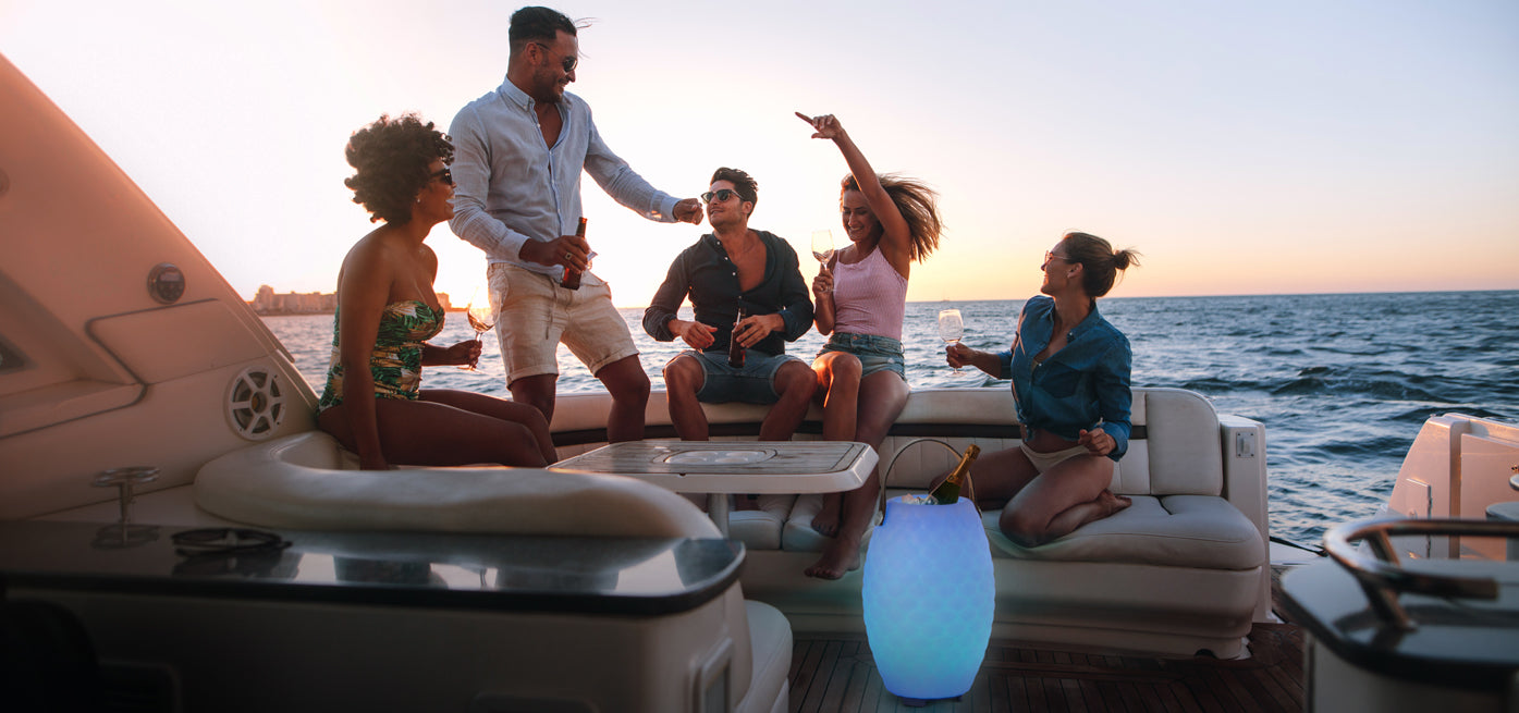 Joouly LTD lamp and speaker on yacht with partying guests