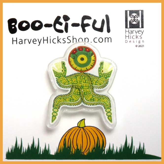 Halloween pin featuring an illustration of Quetzalcoatl the serpent god