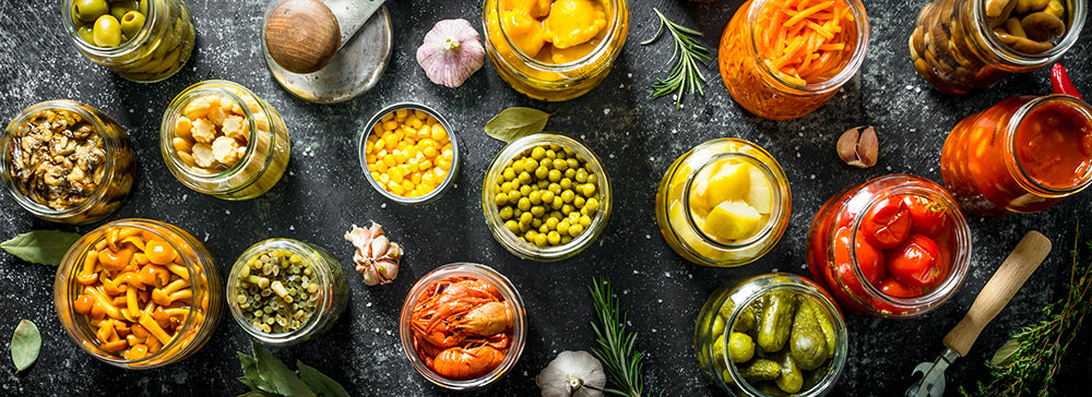 Array of pickles in jars--the sour flavor