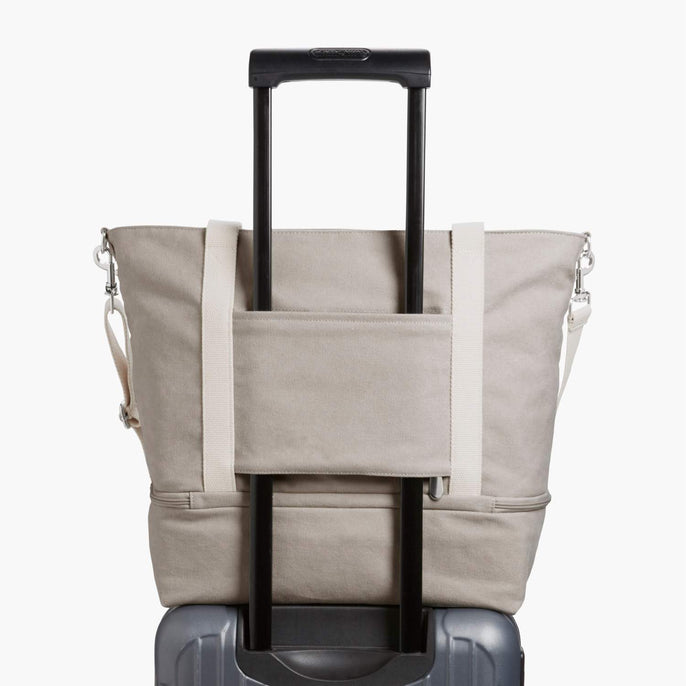 tote with luggage sleeve