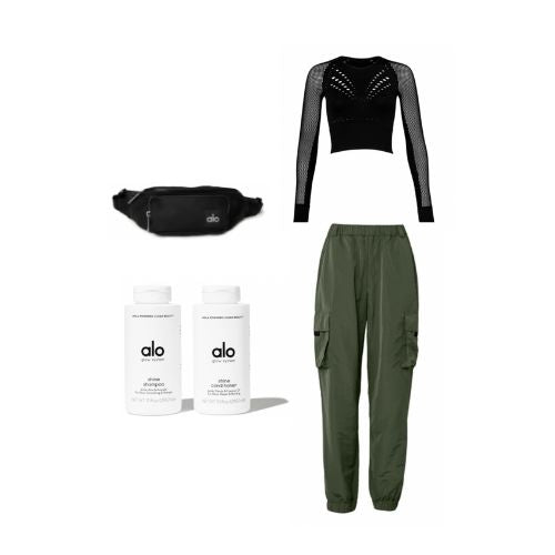 An image of product flatlays including Alo’s Shine Shampoo & Conditioner, a pair of dark green cargo-style pants, a black mesh-detailed long sleeve, and a black fanny pack. 