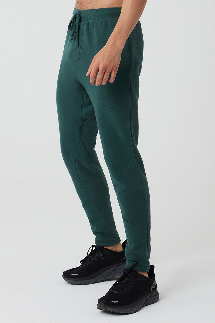 The Triumph Sweatpant Midnight Green Alo Yoga