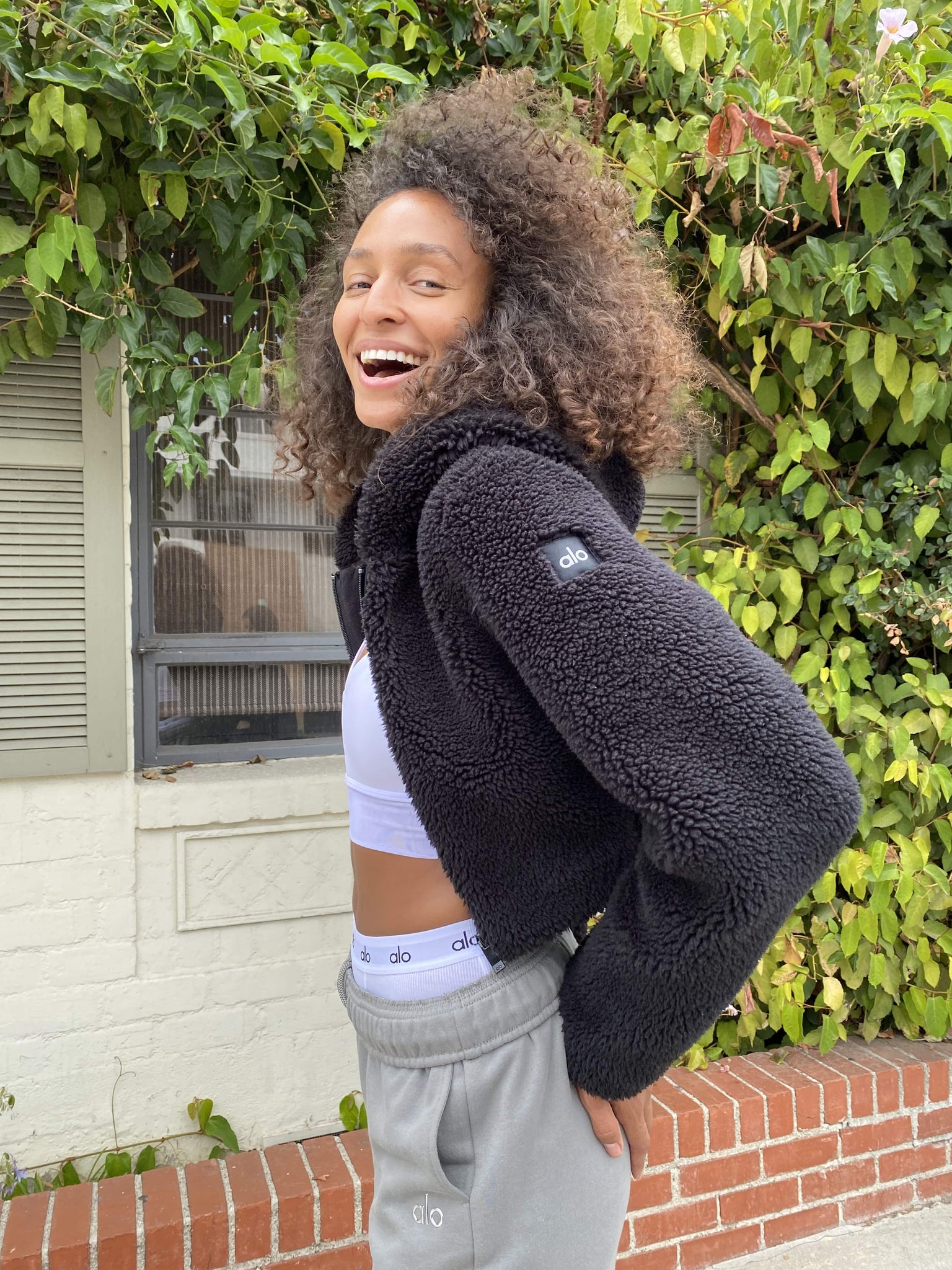 Cozy up in the Alo Yoga Flurry Sherpa Jacket