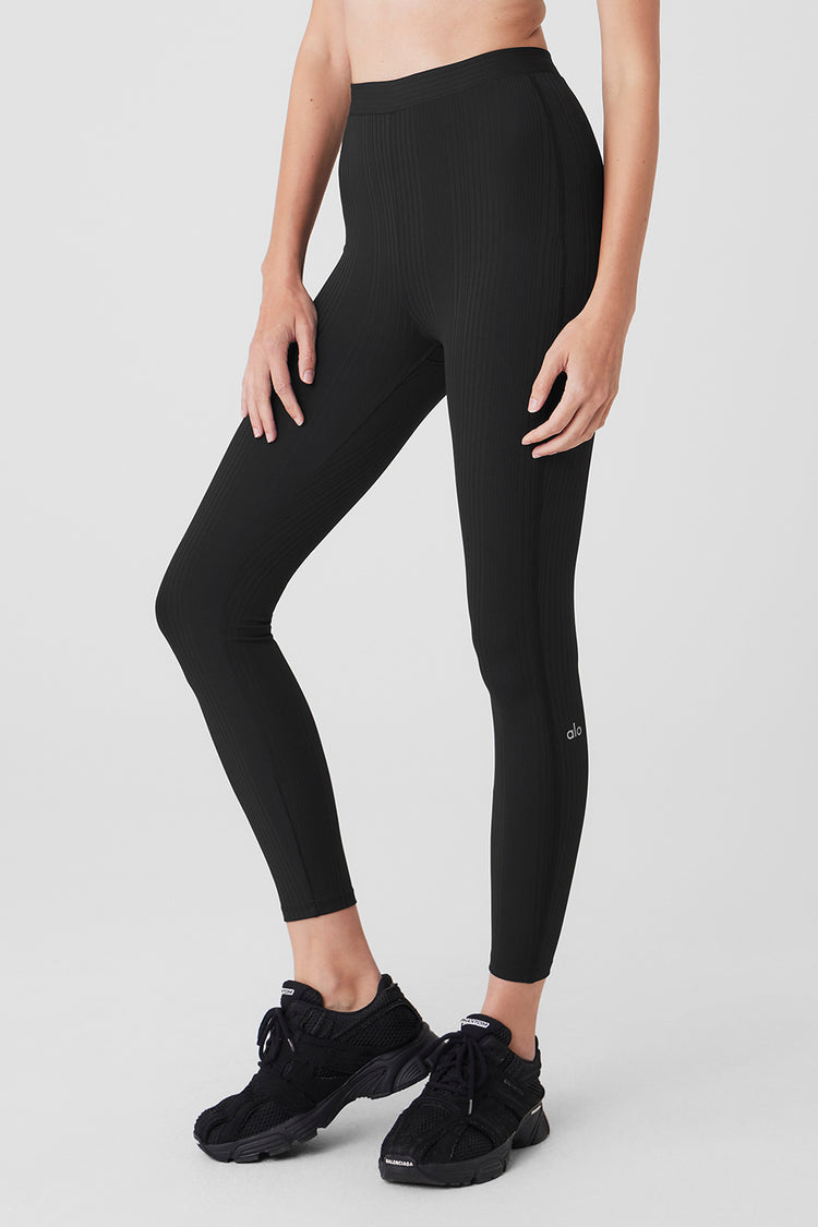 Black and gray Nike rub tights with leg logo