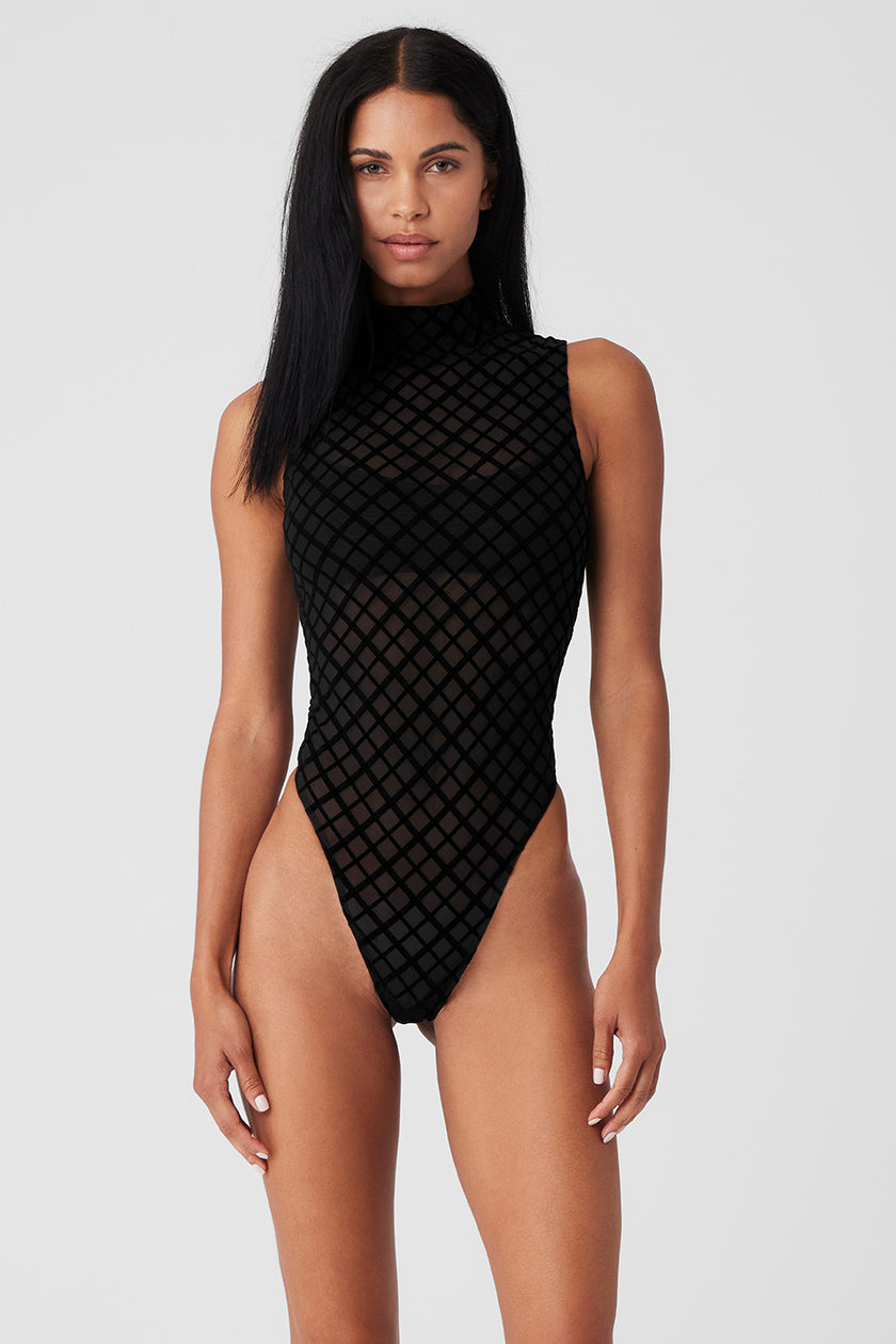 Catch me in this @Alo Yoga bodysuit all spring and summer bc it's