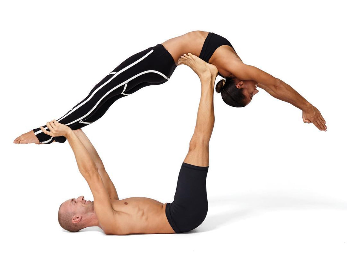 Young Women Practicing Balance Acro Yoga Pose Over White Wall. Pair Female Acro  Yoga Concept Stock Photo, Picture and Royalty Free Image. Image 120777211.