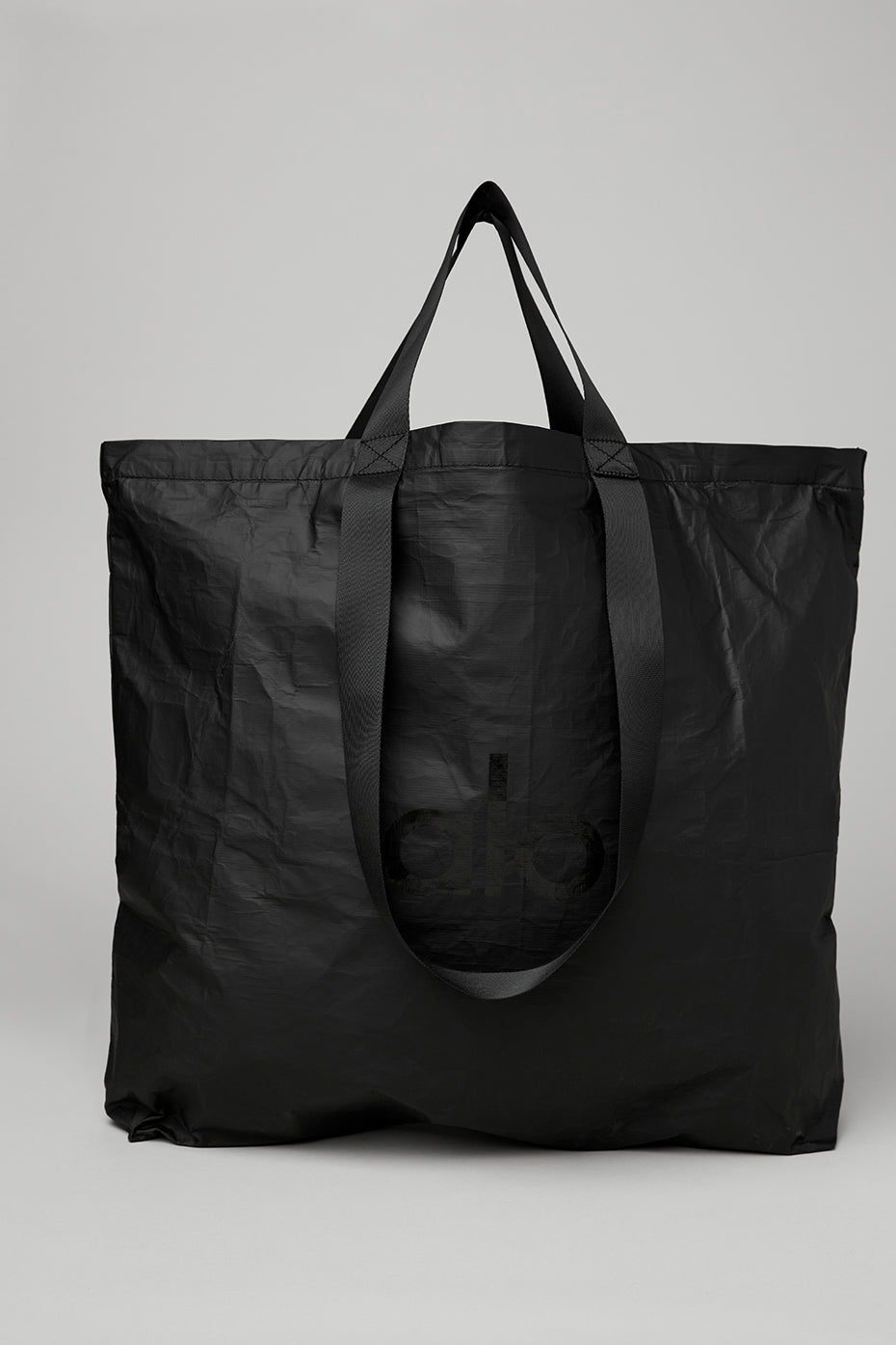 Alo Yoga  Traverse Duffle Bag in Black/Silver - ShopStyle Travel