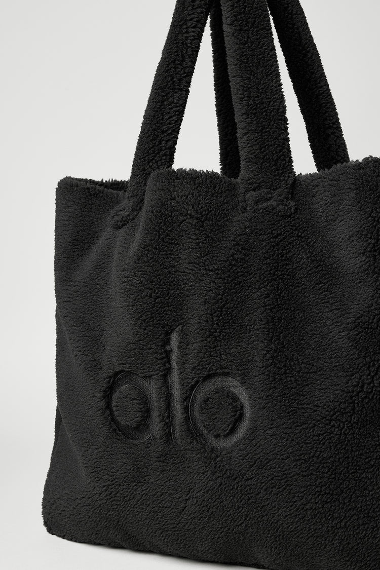 Stay cozy and stylish with the ALO Yoga Foxy Sherpa Tote Bag