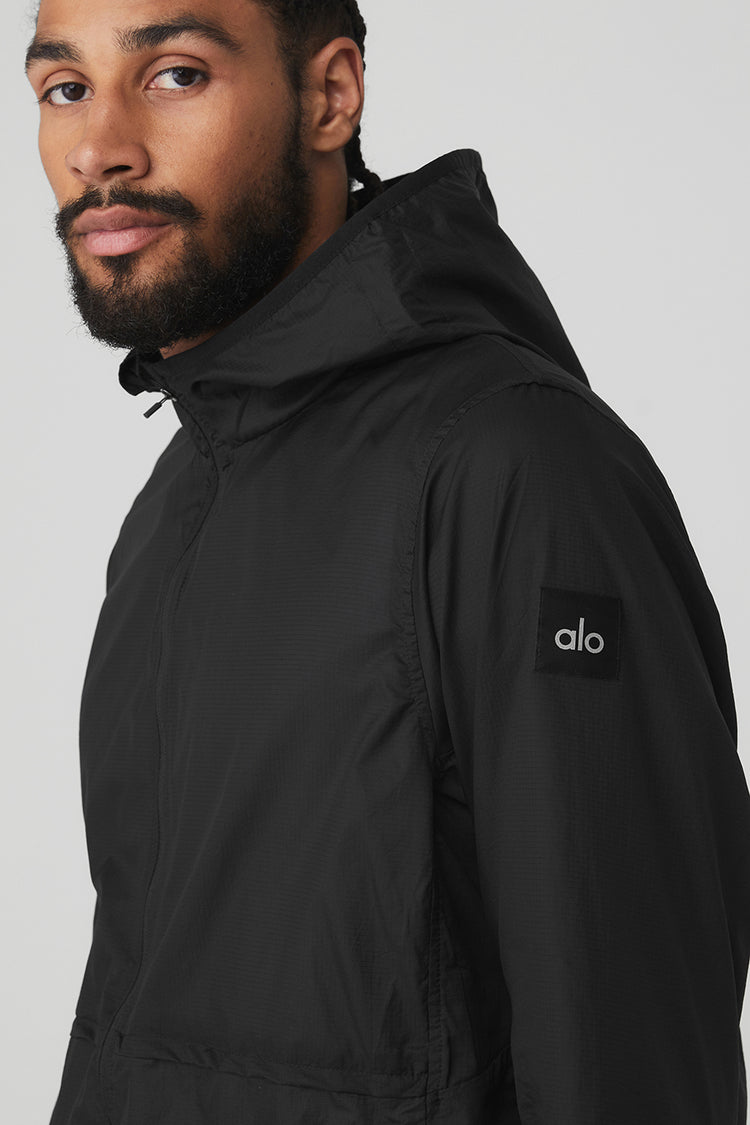 Dynamic Jacket in Black by Alo Yoga