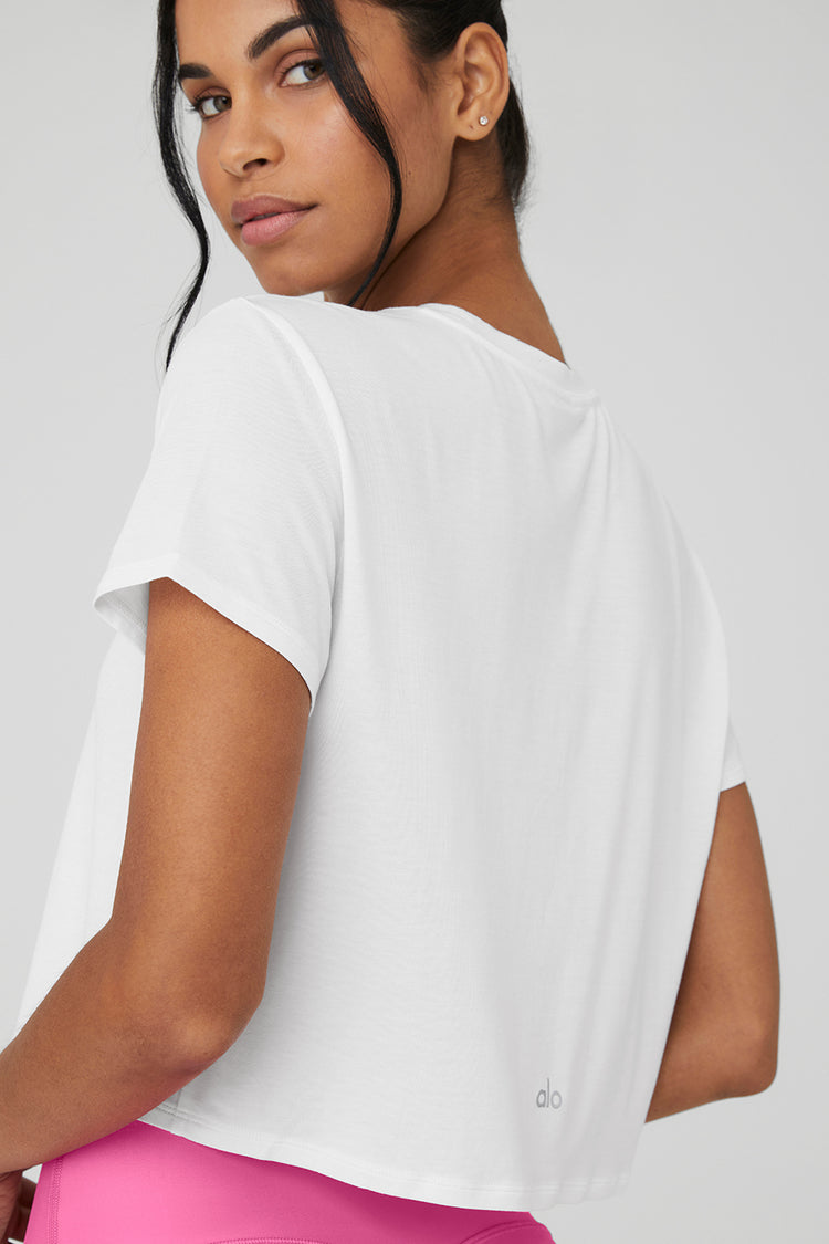 Kick It Crop T-Shirt in White by Alo Yoga