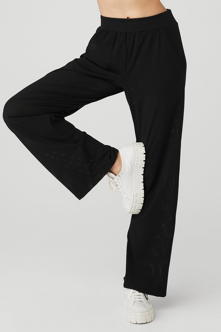 Ultra comfy black pants with oversized side slits.