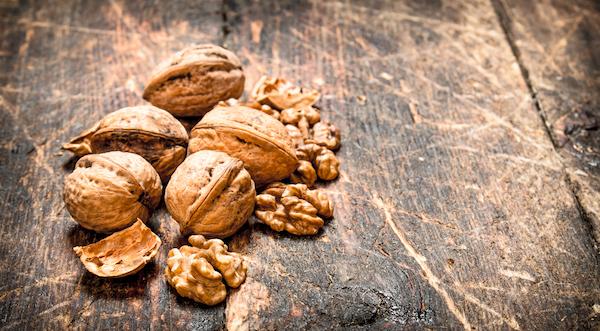 Walnuts on a wooden table top