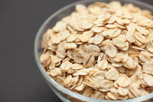 Glass bowl filled with rolled oats