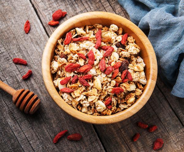 Bowl of muesli covered with goji berries