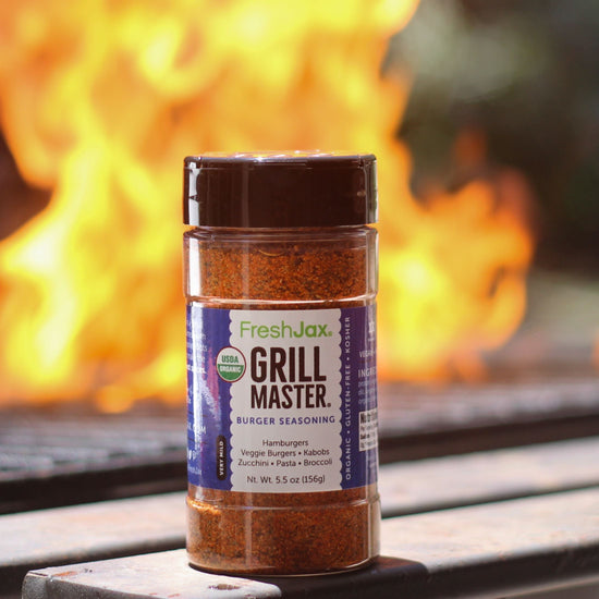 FreshJax Grill Master Burger Seasoning in front of fire