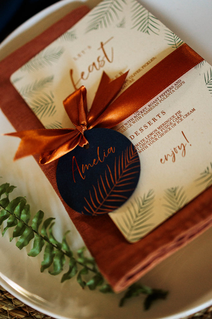 fern leaf menu card with ribbon and place card