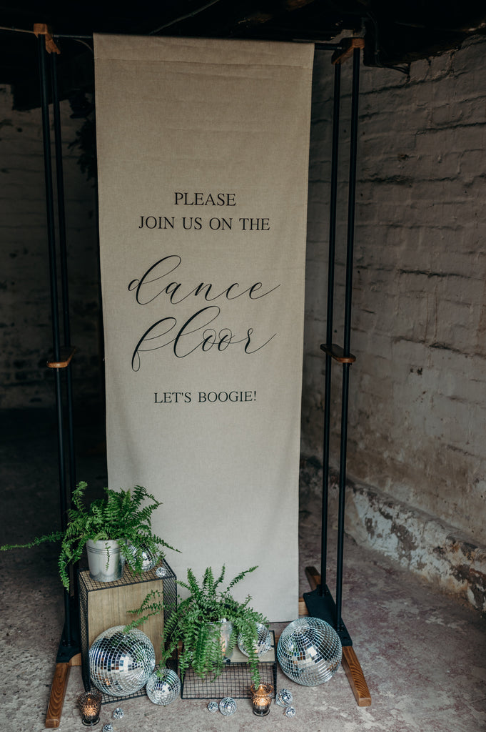 dancefloor wedding sign