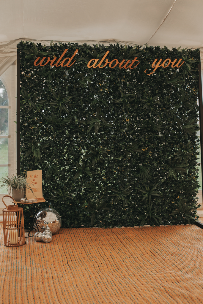 botanical greenery wall photo booth