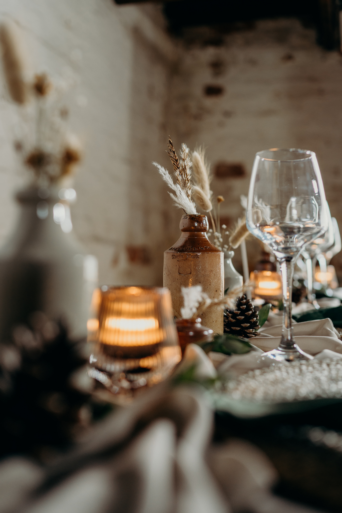 vintage stoneware bottles with dried flowers wedding tablescape