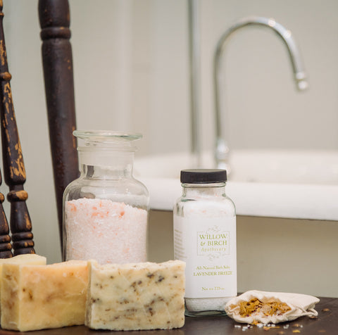 Willow & Birch Apothecary bath products in front of antique tub