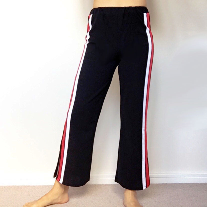 black trousers with red and white stripe