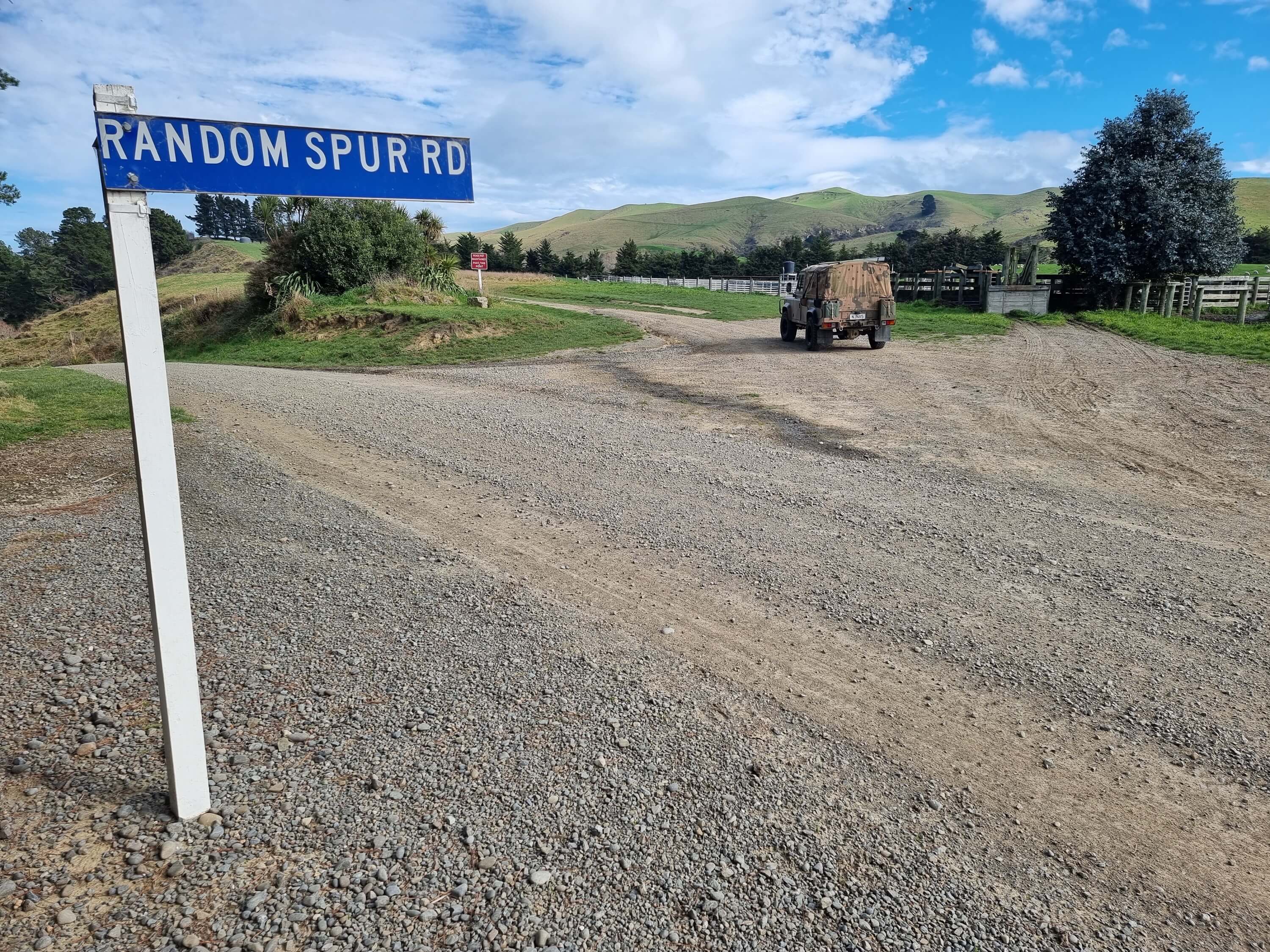 random spur road entrance with land rover perentie