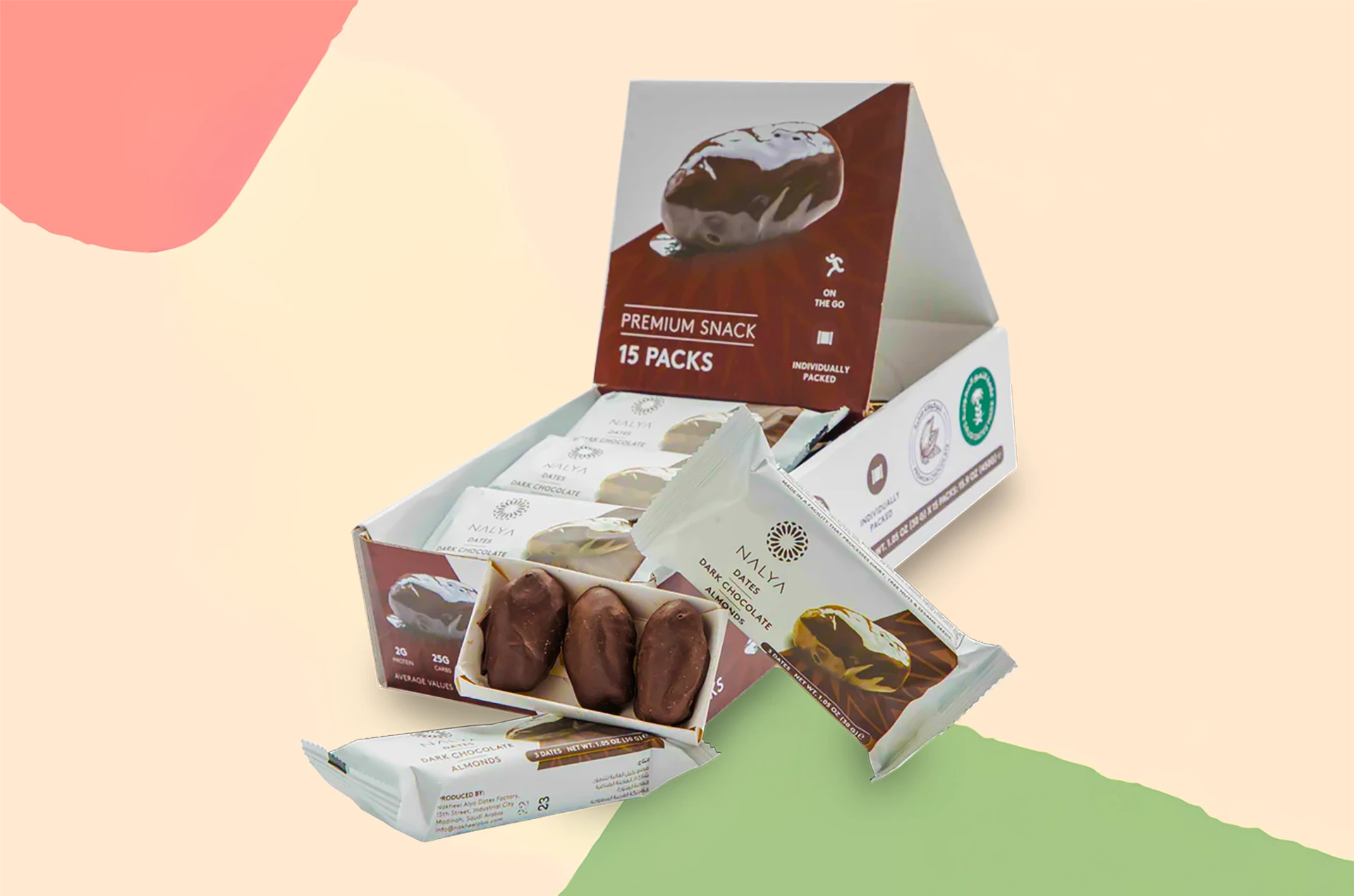A 15-pack display box and several individual snack packs of Nalya brand Dark Chocolate Almonds, noted as the best healthy snack for dietary restrictions.