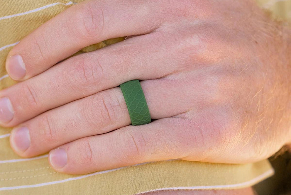 a man wearing the journey silicone ring in green