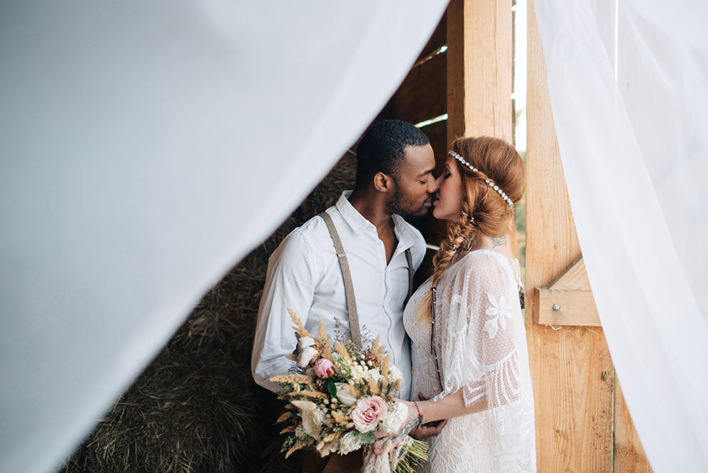 bride groom kissing