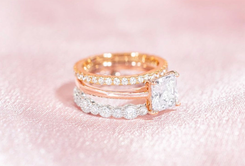 the promise in gold the olivia in rose gold and the mia in silver stacked on top of each other