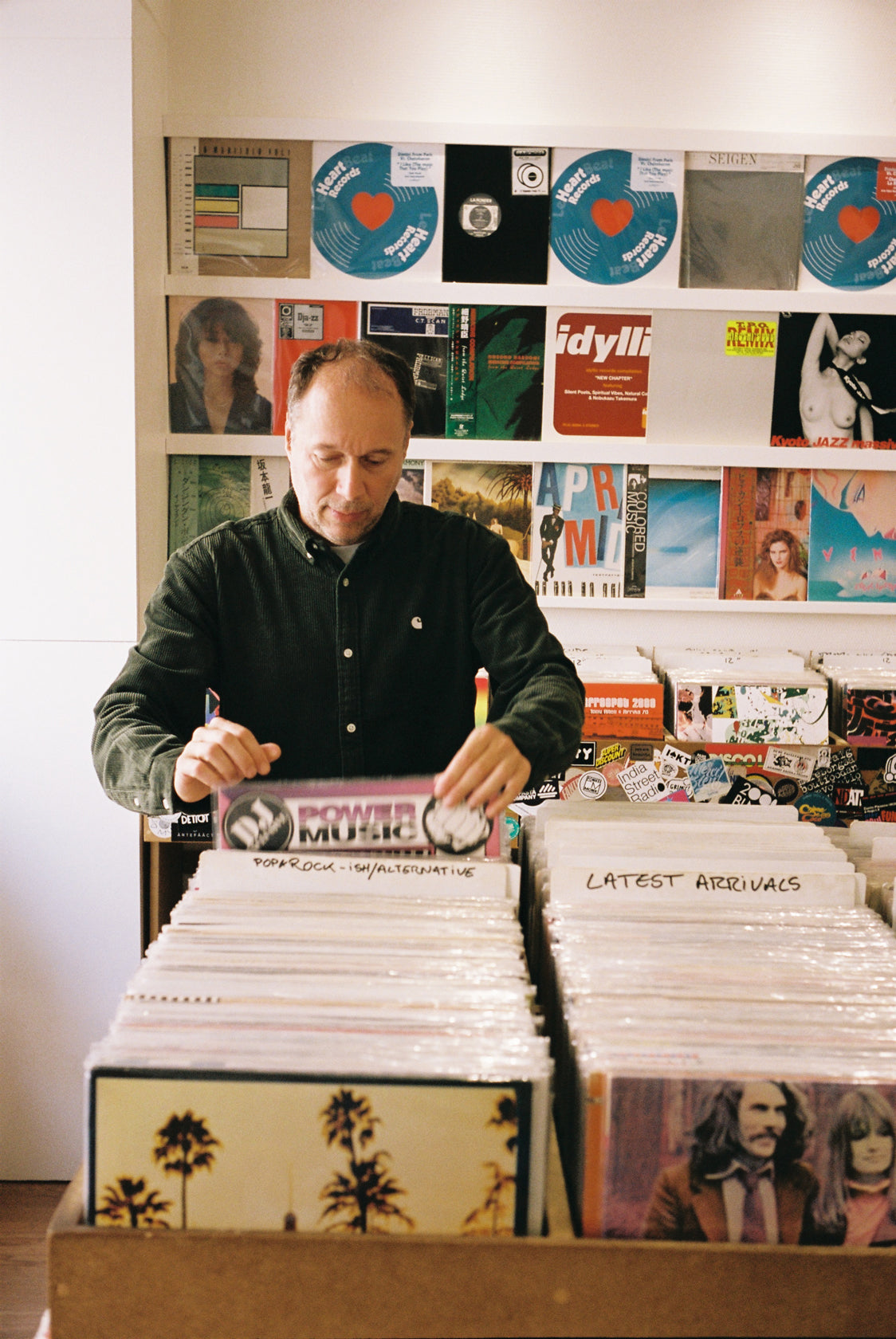 Alex from Tokyo looking thorough vinyl albums