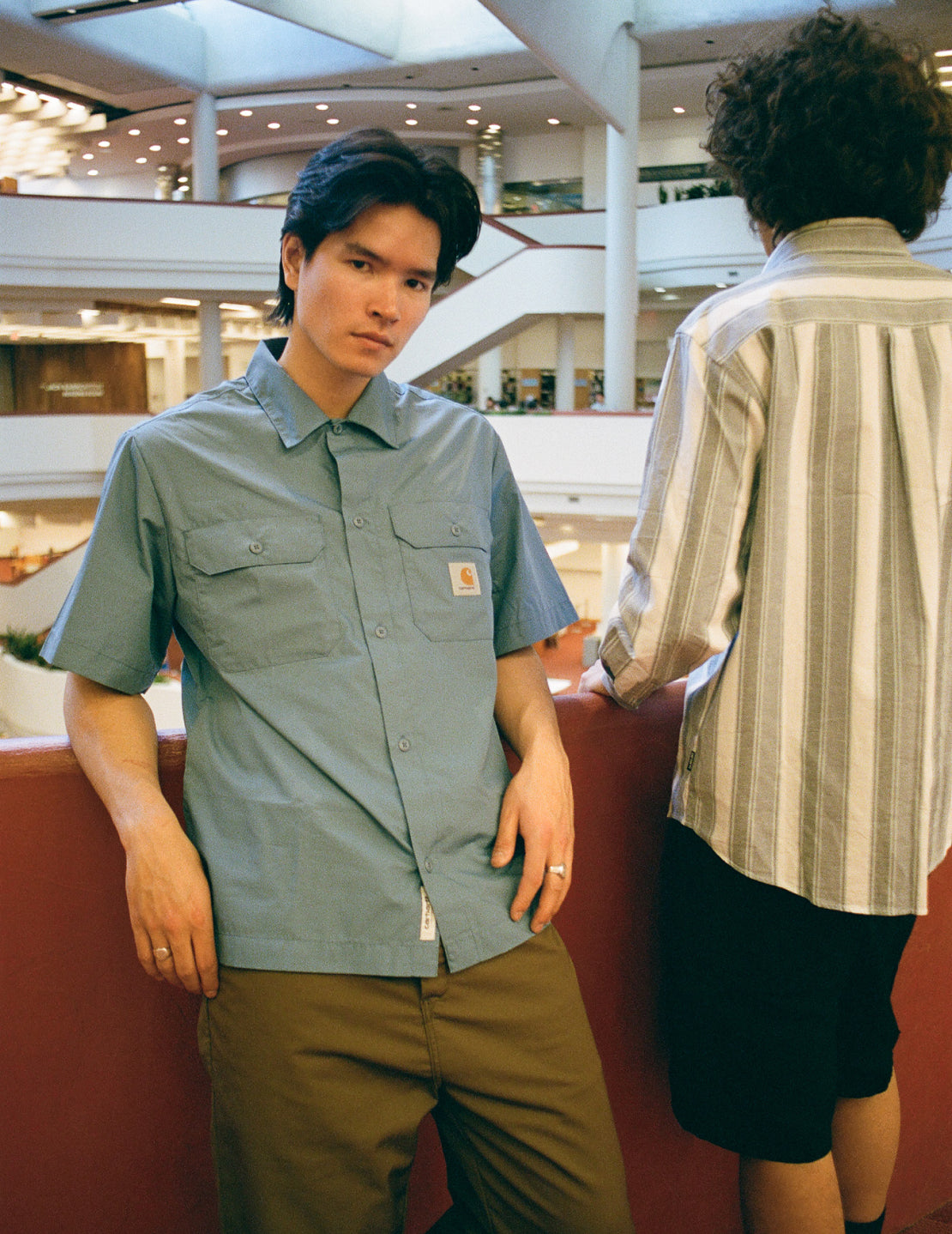 Model wearing a Carhartt WIP Craft Short Sleeve Shirt in Sorrent