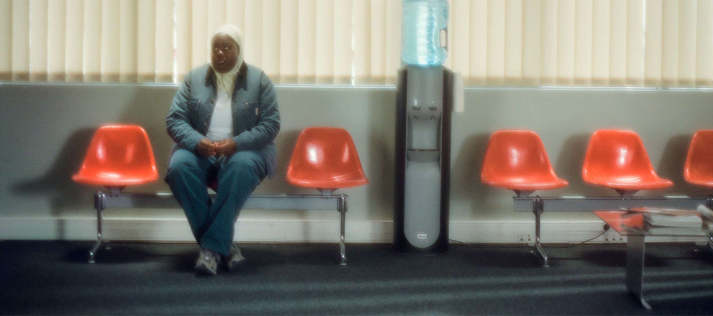 Model sitting alone in waiting room