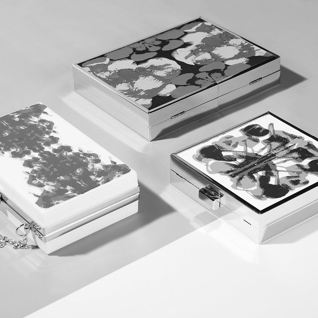 3 Hard Case Clutch Purses Black & White Image