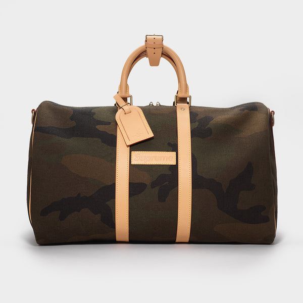 LOUIS VUITTON X SUPREME CAMO HOLDALL – Mr Trendz